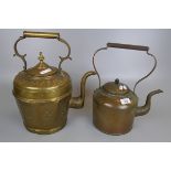 Large brass kettle together with a copper kettle