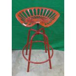 Wrought iron tractor seat stool