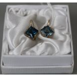 Pair of gold blue topaz earrings
