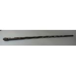 Ebonised carved walking cane