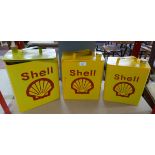 3 graduated metal storage boxes in the form of Shell oil cans