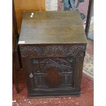 Carved oak cabinet with its lock and key