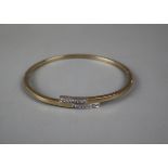 Gold and diamond bangle