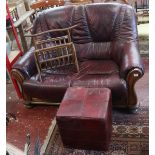 Oak framed leather two seater sofa together with foot stool and bamboo magazine rack