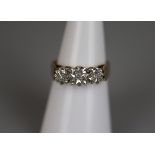 Gold three stone diamond ring - Size L