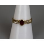 18ct gold ruby and diamond ring - Size P