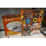 Mash radio controlled helicopter together with an Action Man photo mission still in box