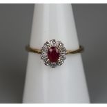 Gold ruby and diamond cluster ring - Size O