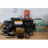 Collection of cameras and binoculars