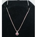 White gold ruby and diamond set necklace