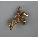 Gold charm horse with rider