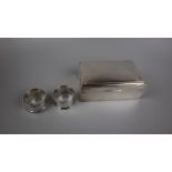 Hallmarked silver cigarette box together with silver napkin rings