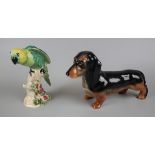 Beswick dog and parrot