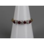 18ct gold ruby & diamond set ring - Approx size: M