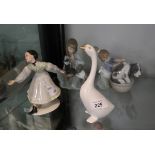 2 Lladro girl figures together with 2 others