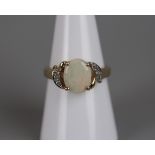 Gold opal & diamond set ring - Approx size: N