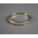 Heavy gold diamond set bangle