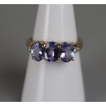 Gold tanzanite & diamond set ring - Approx size: N