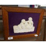 Carved marble plaque in oak frame