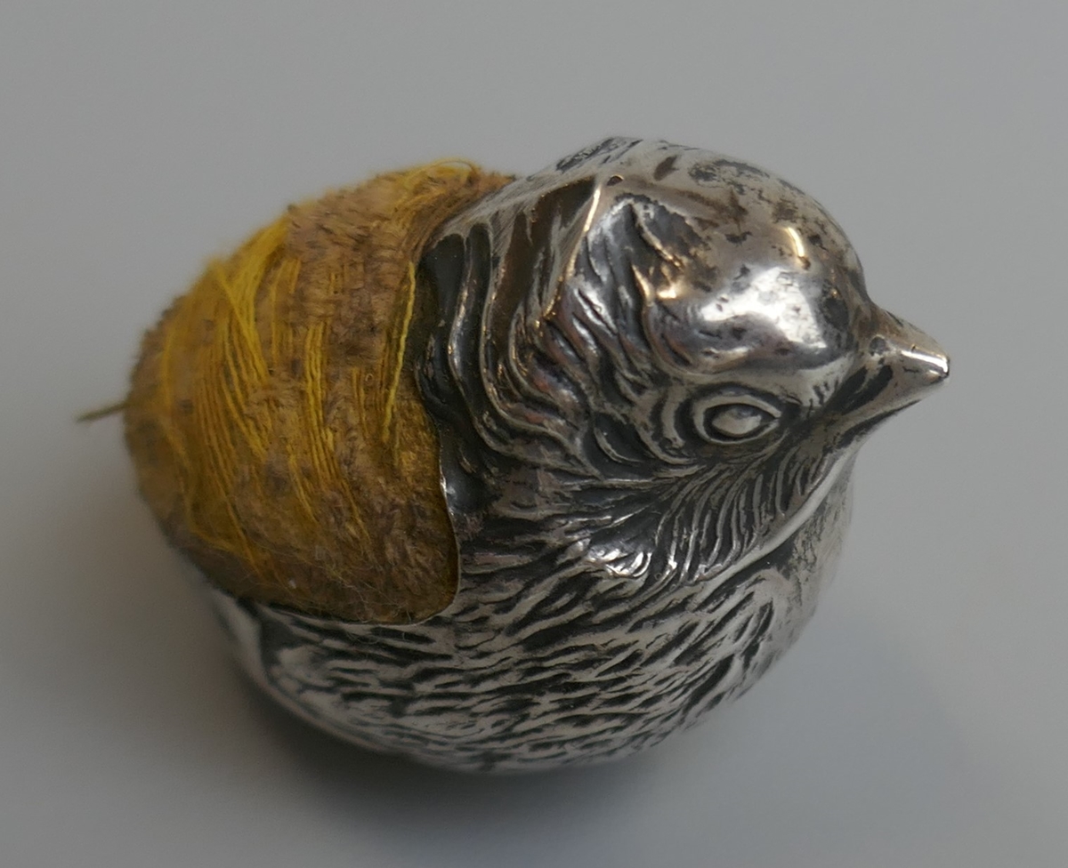 Hallmarked silver pin cushion in the form of a bird