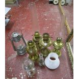 Collection of brass oil lamps and Tilly lamps