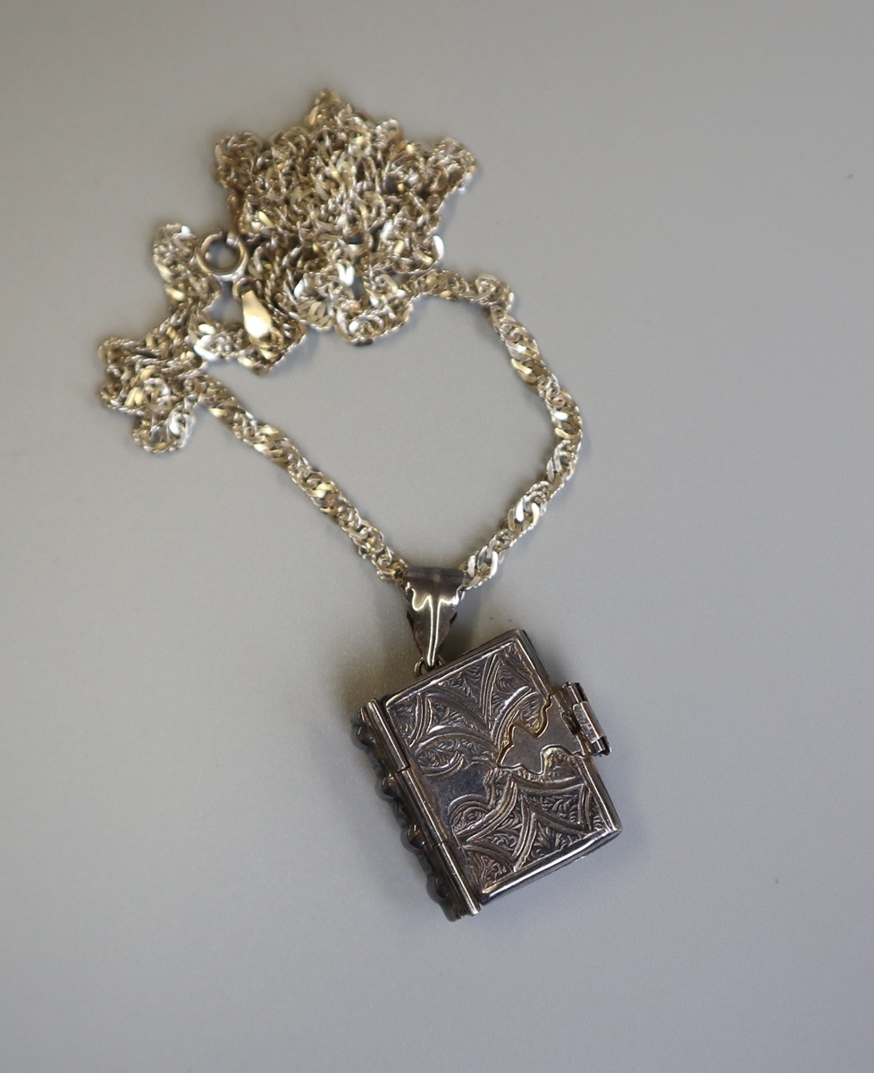 Silver book locket on silver chain