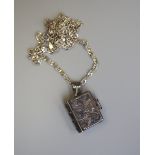 Silver book locket on silver chain