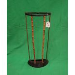 Bamboo & cast iron stick stand