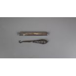 Silver fruit knife together with a silver handled button hook