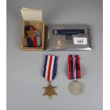 3 WWII medals and a German POW cigarette case