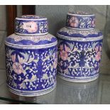 Pair of Oriental lidded urns