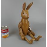 Wooden articulated rabbit figure