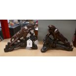 Pair of carved Oriental panthers