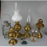 Collection of brass oil lamps and Tilly lamps