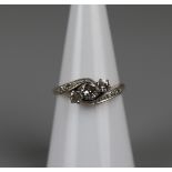 3 stone diamond set 18ct gold ring ?