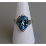 Gold blue topaz & diamond set ring - Size M½