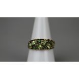 Gold peridot set ring