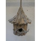 Rustic driftwood bird house