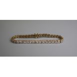 Fine 18ct gold diamond tennis bracelet - Approx weight 15.5g