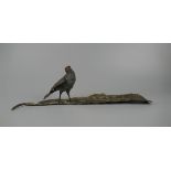Large Austrian cold-painted bronze model of bird sitting on a feather cast by Franz Bergman of