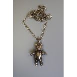 Silver articulated teddy bear pendant on chain