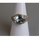 Gold aquamarine & diamond set ring - Size N