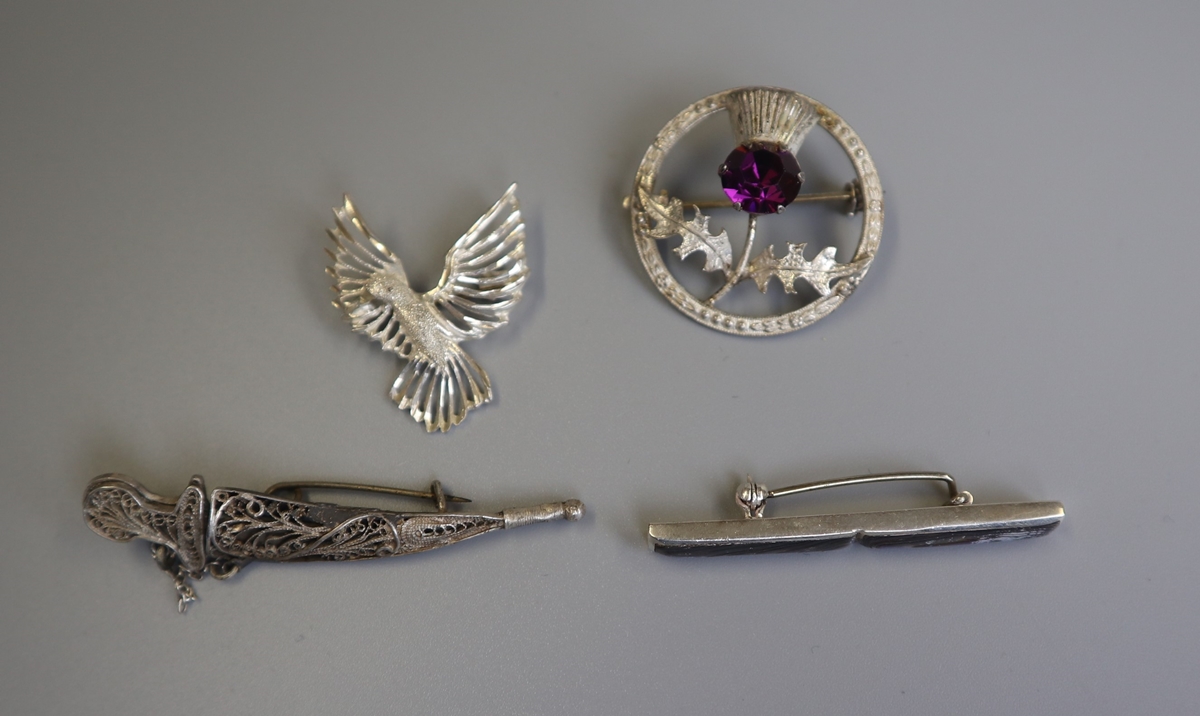 4 silver brooches