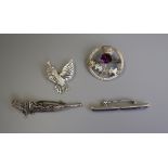 4 silver brooches