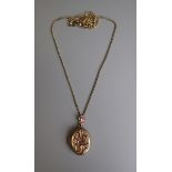 Gold locket and chain