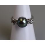 18ct white gold, large black pearl & diamond set ring - Size N