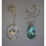 2 crystal pendants on silver chains