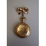 14ct gold Waltham fob watch (damaged) on gold bow