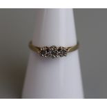 Gold 3 stone diamond set ring - Size N½