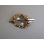 Gold pearl set brooch